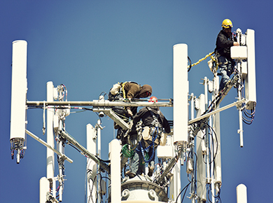 Technicians Servicing Wireless Tower